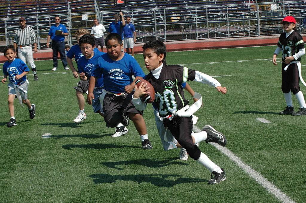 kids playing football